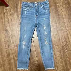Girl’s distressed jeans
